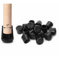 Black round rubber chair leg caps with open sleeve and grip texture; set of caps
