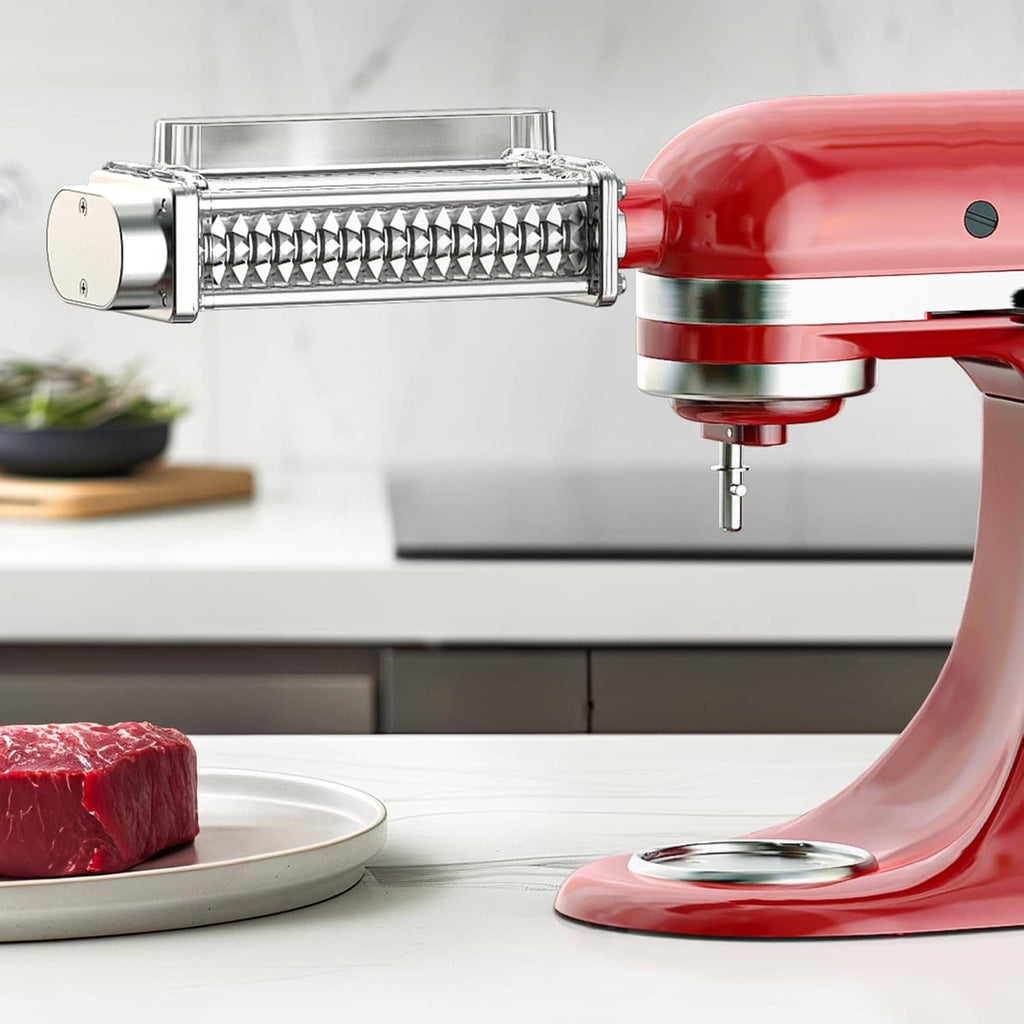 Chrome meat tenderizer attachment attached to a red stand mixer