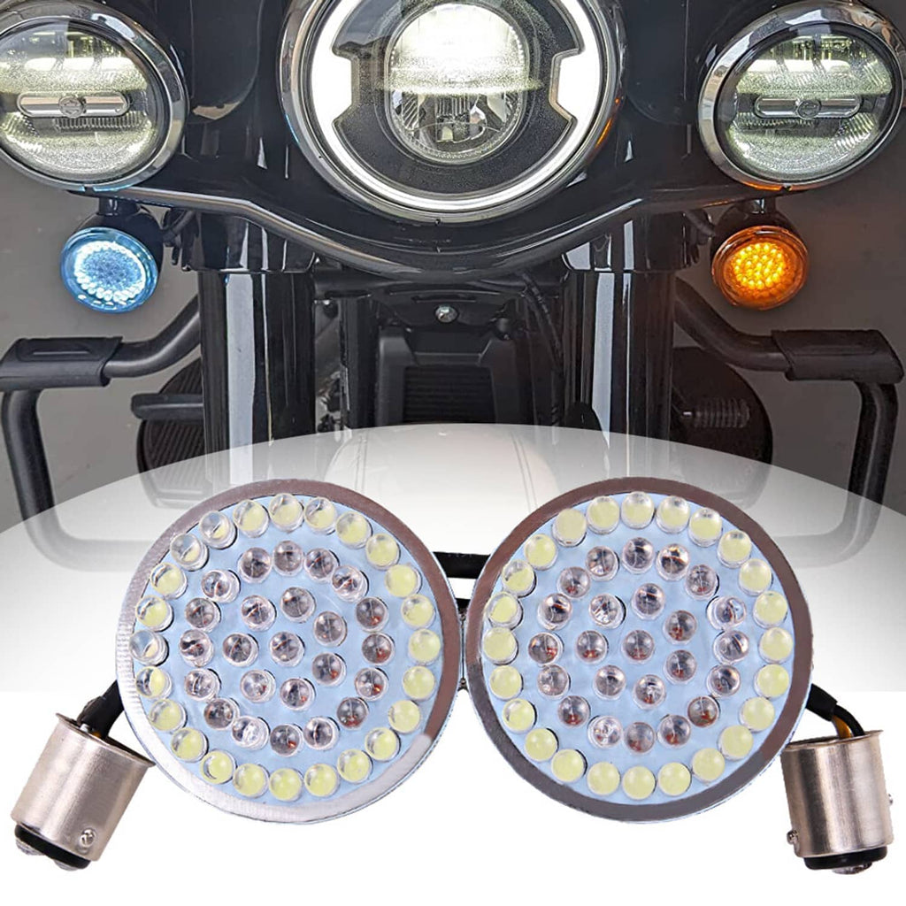 Two round LED turn signal bulbs with visible diode arrays, silver bases, and wire leads