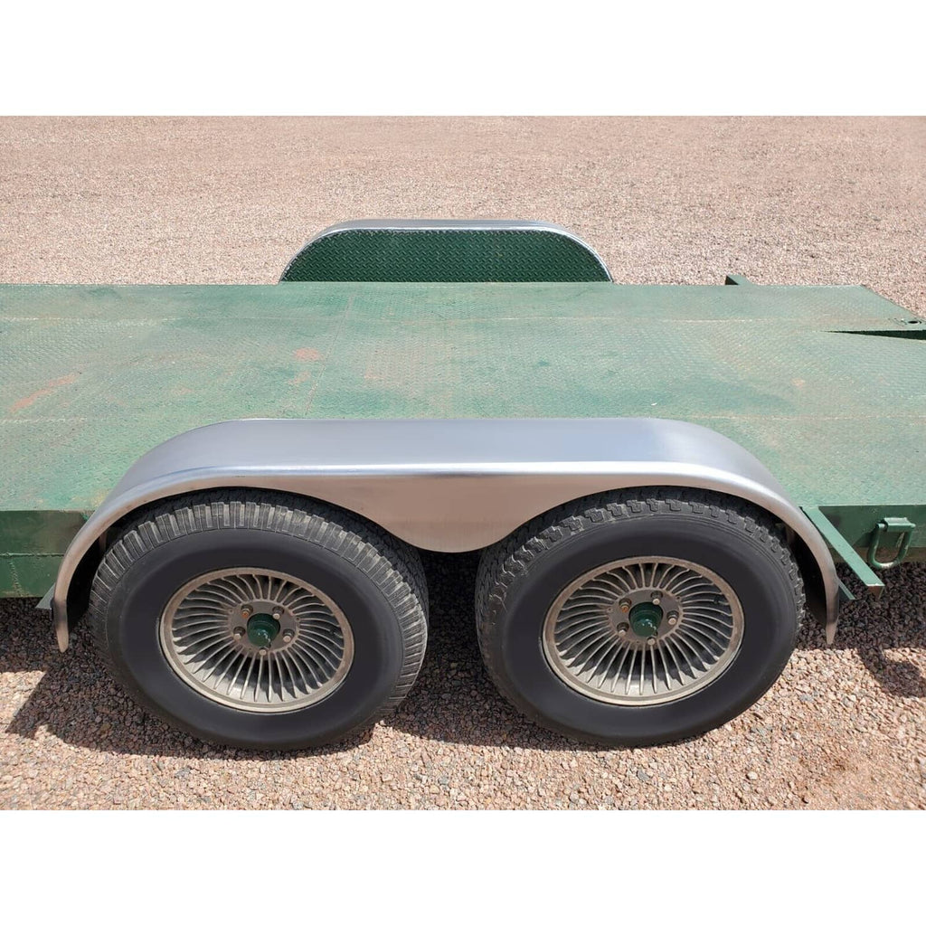 Silver steel fenders on trailer, curved covers over two wheels
