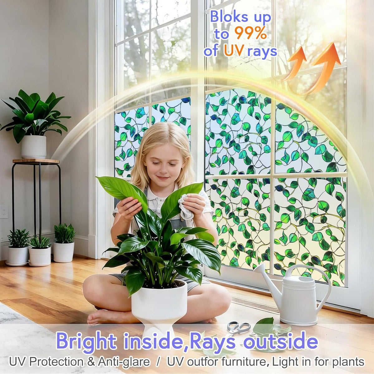 Window privacy film with green leaf stained-glass pattern on a bright home window.