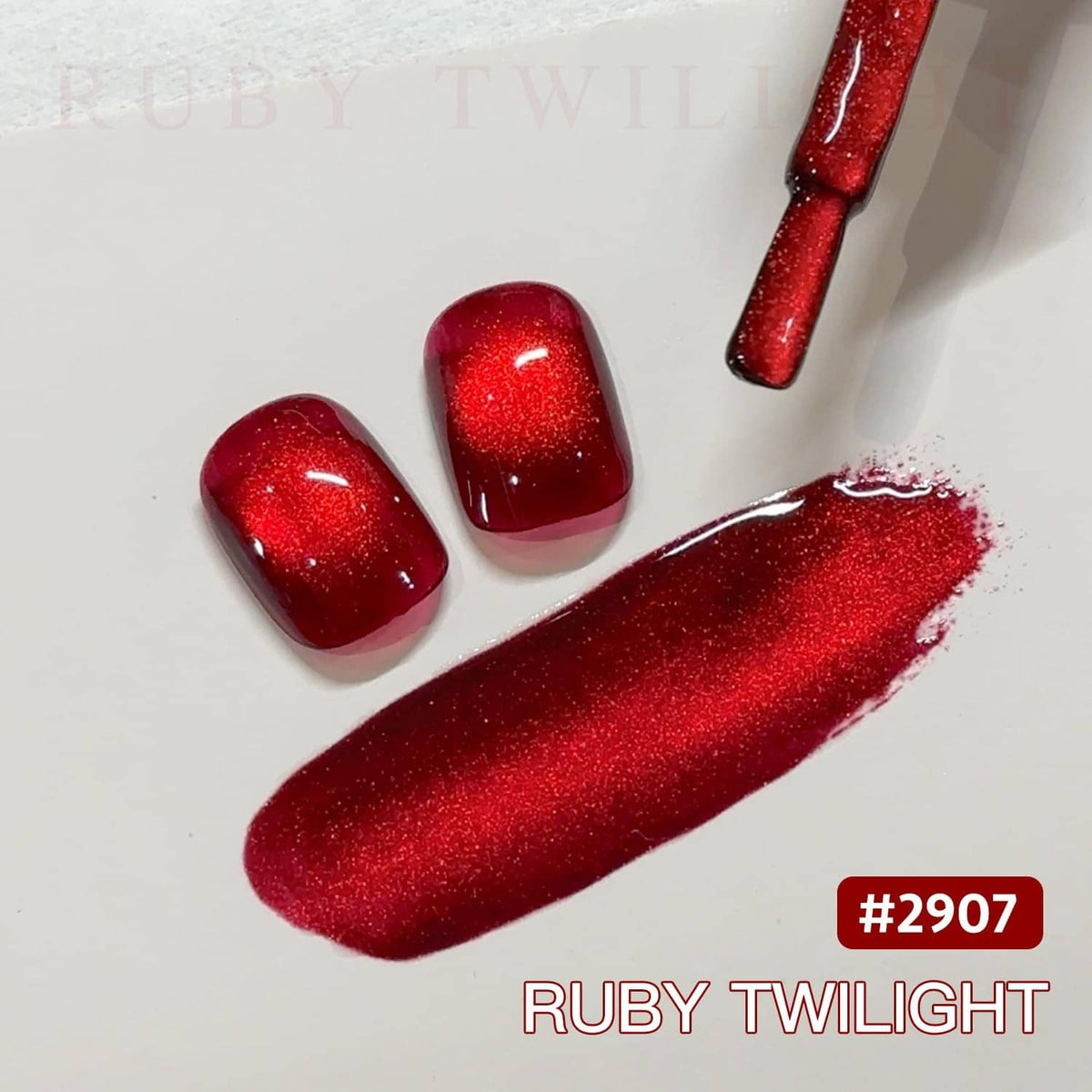 Red cat-eye gel nail polish swatch on nails with bright metallic sparkle.