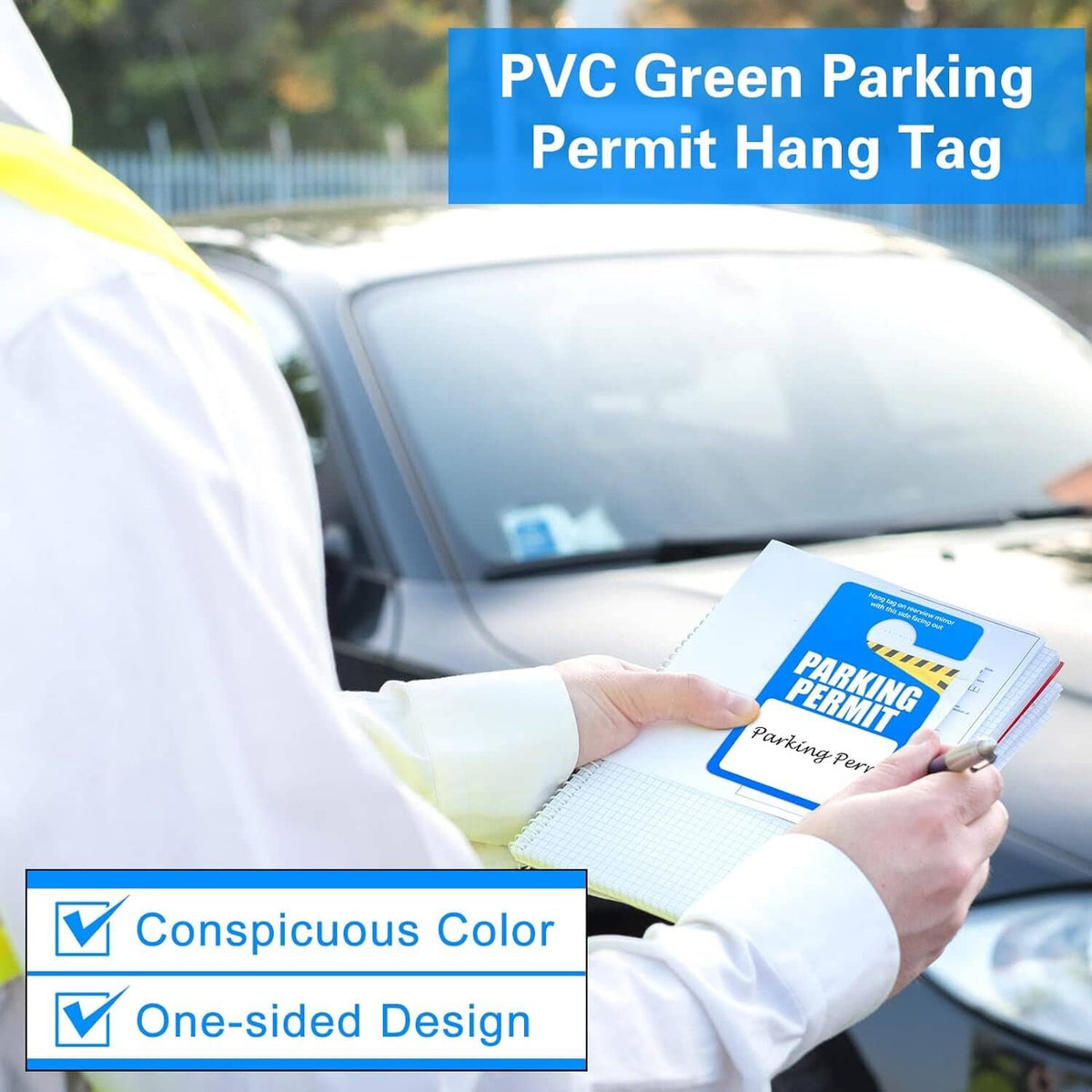Blue PVC parking permit hang tags held in hand, with blank white label