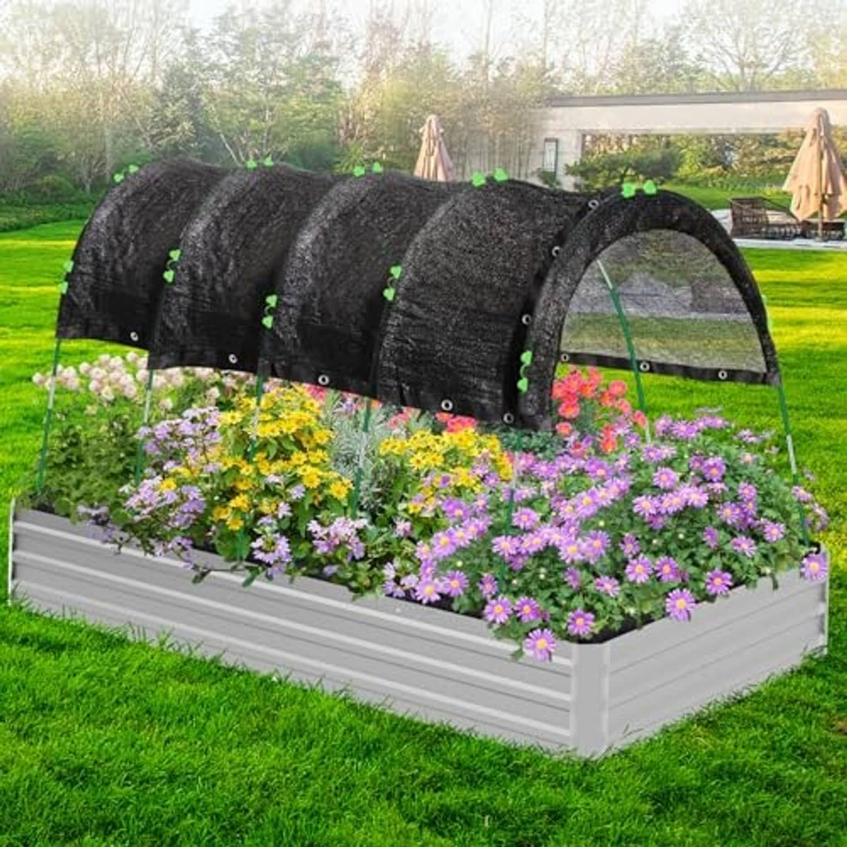 Garden shade cloth with hoops over raised planter bed, dark fabric canopy and green hoop frame