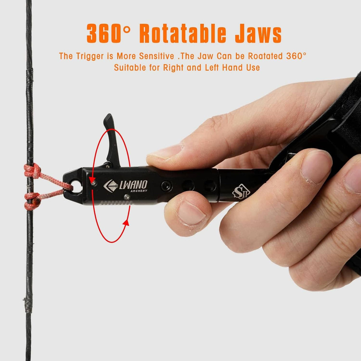Archery trigger release aid with rotatable jaw and wrist strap for left or right use.