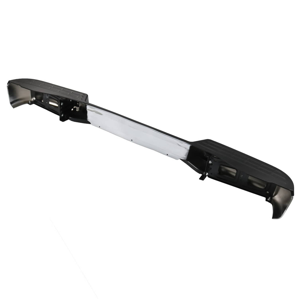 Rear bumper assembly angled view with black mounting brackets and silver face panel