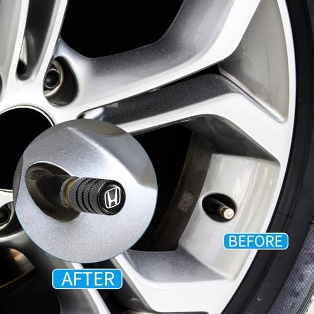 Black tire valve stem cap with white Honda logo installed on wheel valve