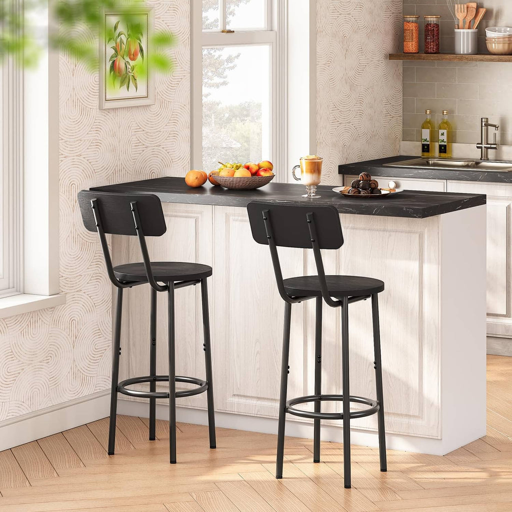 Set of 2 black bar stools with curved backrests, round seats, and circular footrests
