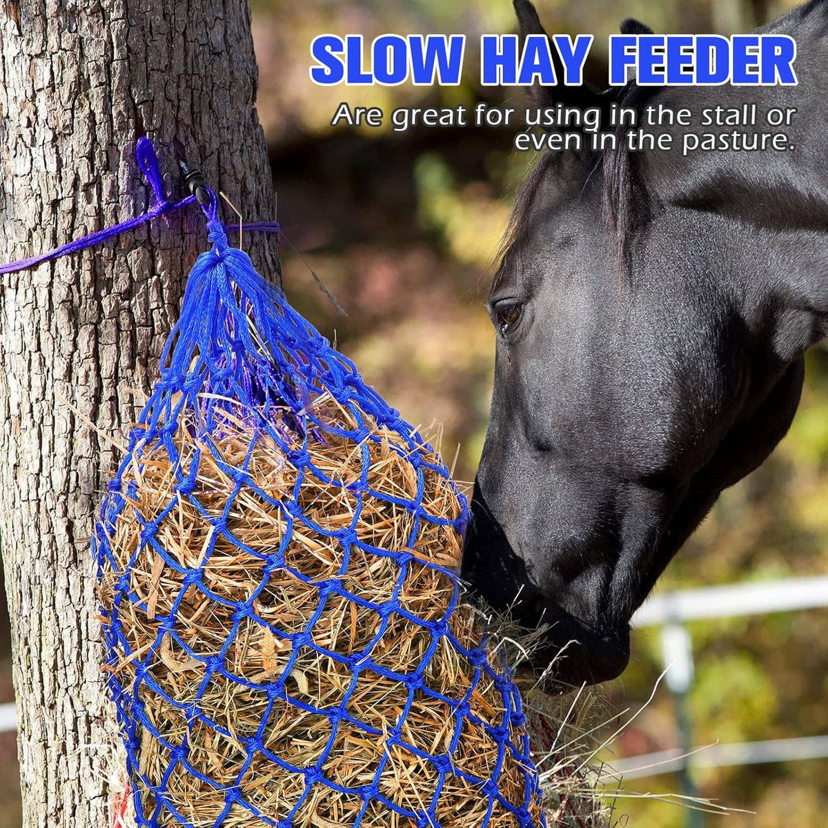 Blue mesh slow feeder hay net bag attached to a post, filled with hay
