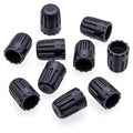 Set of 10 black plastic TPMS tire valve stem caps with ribbed grip design