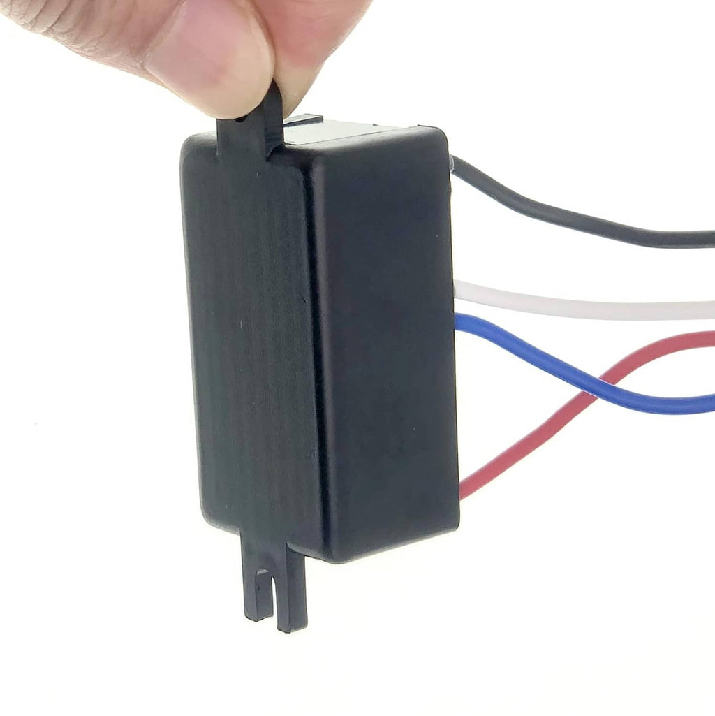 Electronic centrifugal switch oil pump motor held by finger, showing mounting tabs