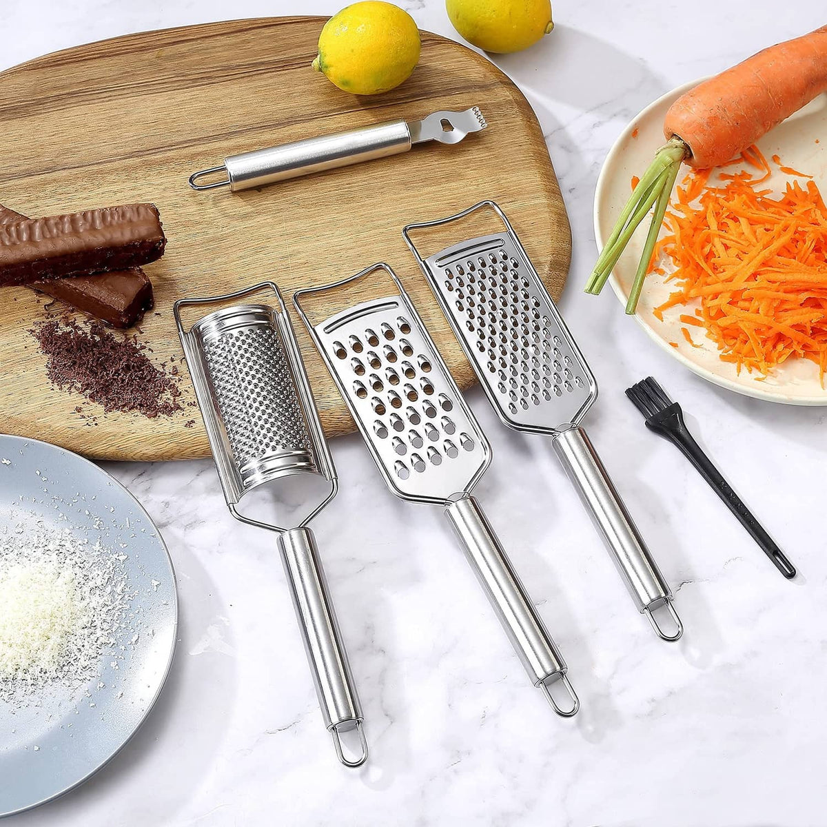 Stainless steel grater set with three grating faces and one cylinder-style grater