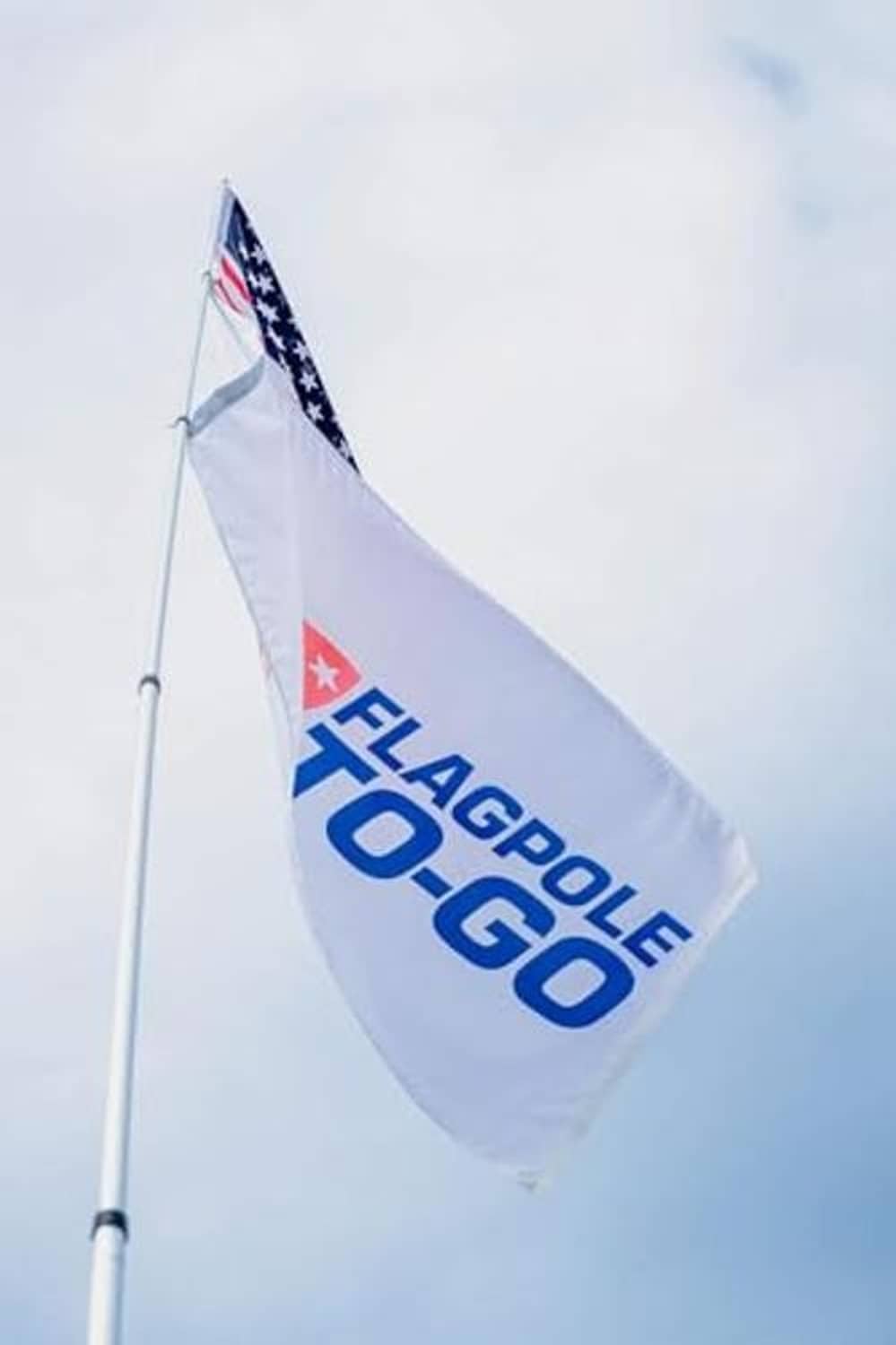 Flagpole To-Go banner flag on a tall white telescoping aluminum pole