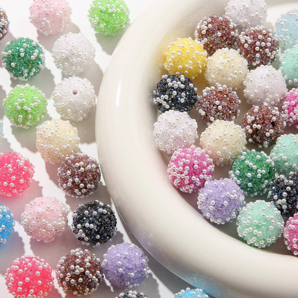 Assorted acrylic round rhinestone beads with pearl-like sparkle, pastel and dark tones