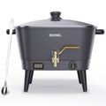 Black electric wax melter with lid, brass spigot faucet, and digital temp display