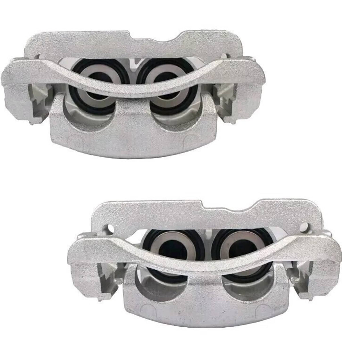 Top-view silver front brake calipers with dual piston bores visible