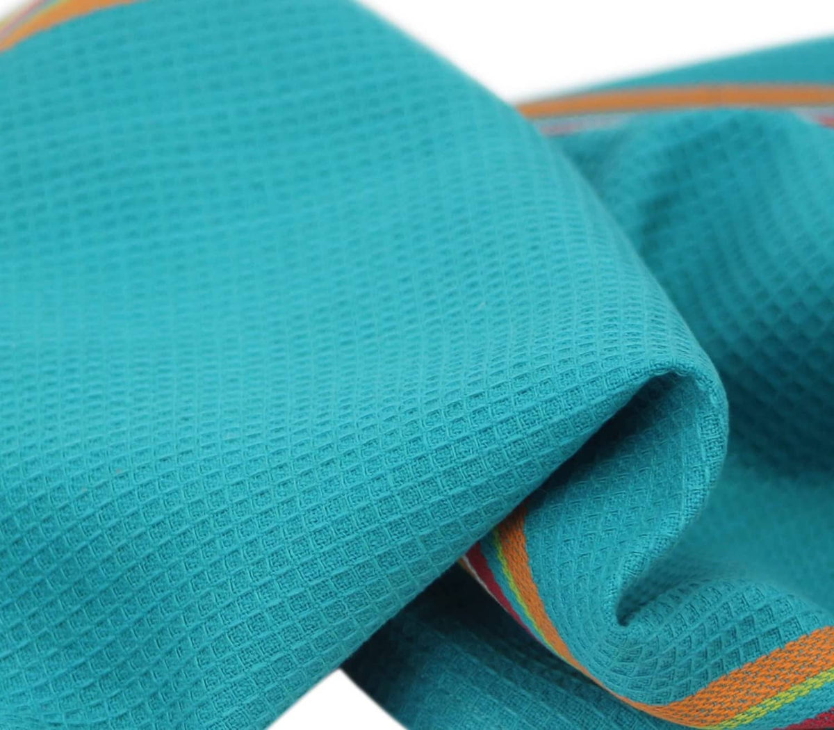 Teal cotton kitchen towel with multicolor stripe border, rolled and folded