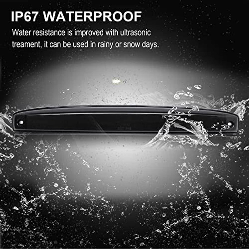 Smoked red LED tailgate light bar with water droplets, black housing