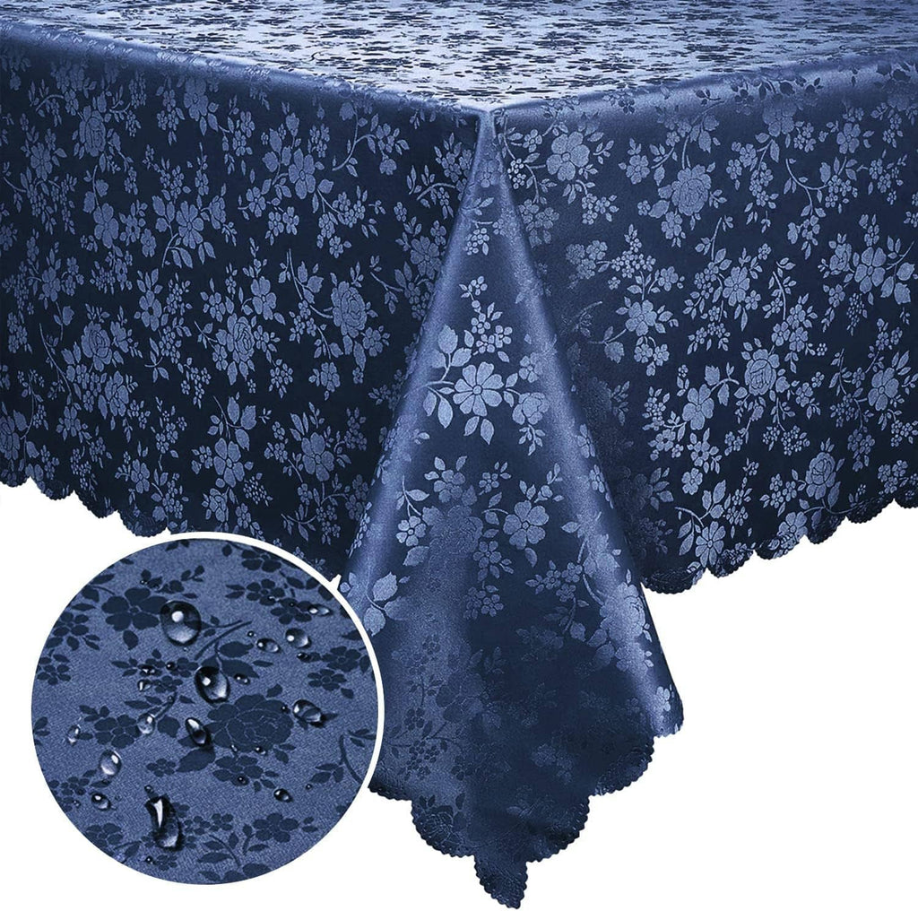 Water-repellent blue floral vinyl tablecloth with scalloped edge and droplet detail