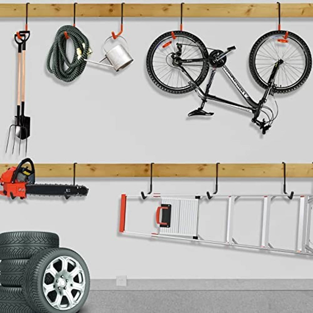 Wall-mounted bike storage hooks array with orange grips and black metal supports
