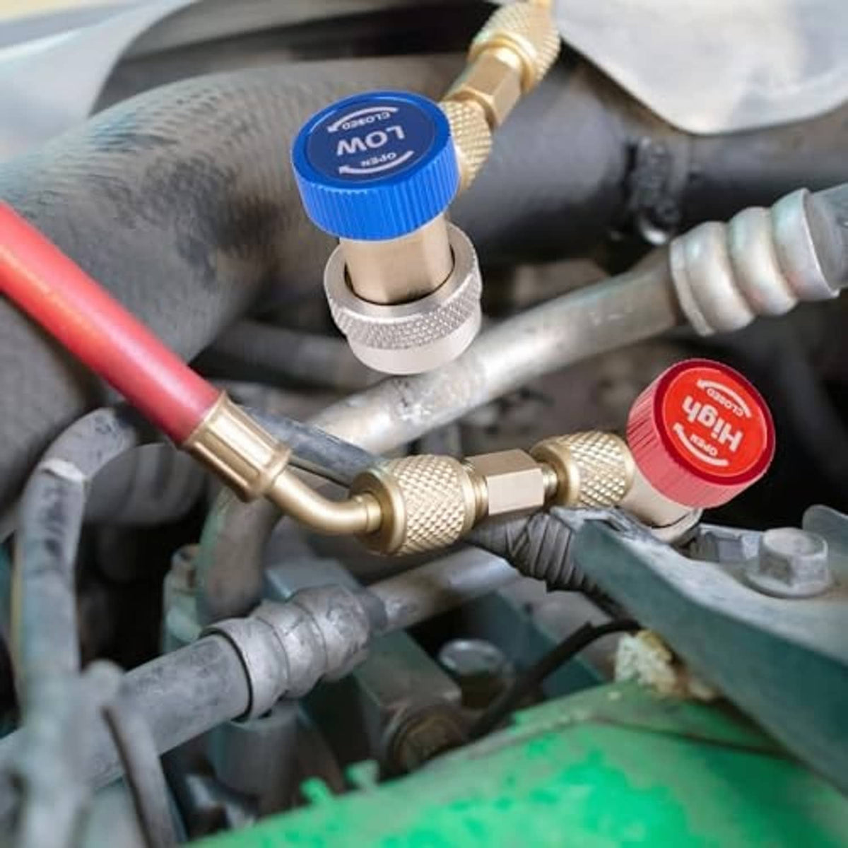 R134a refrigerant adapter hose fittings with brass couplers and red/blue shutoff caps