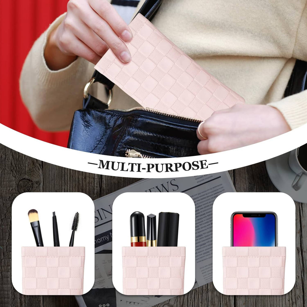 Pink checkered squeeze-top sunglasses case with metal zipper pull, held in hand
