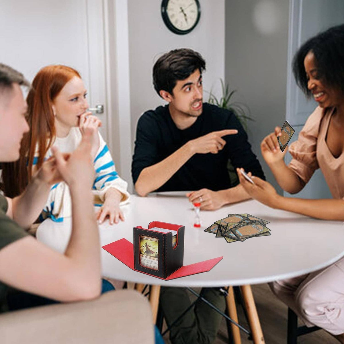 Card deck box on a table in a group setting, showing cards stored inside