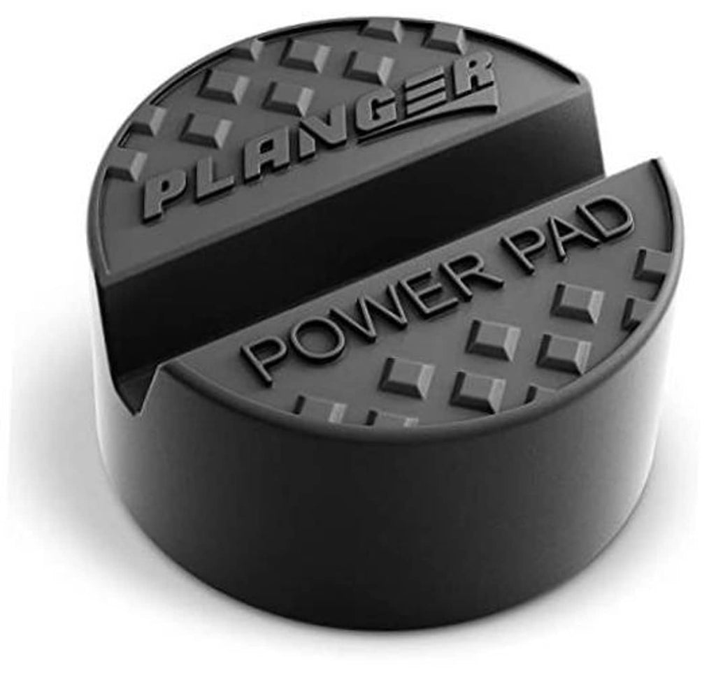 Flat rubber jack pad with textured tread and V-shaped grip channels on top