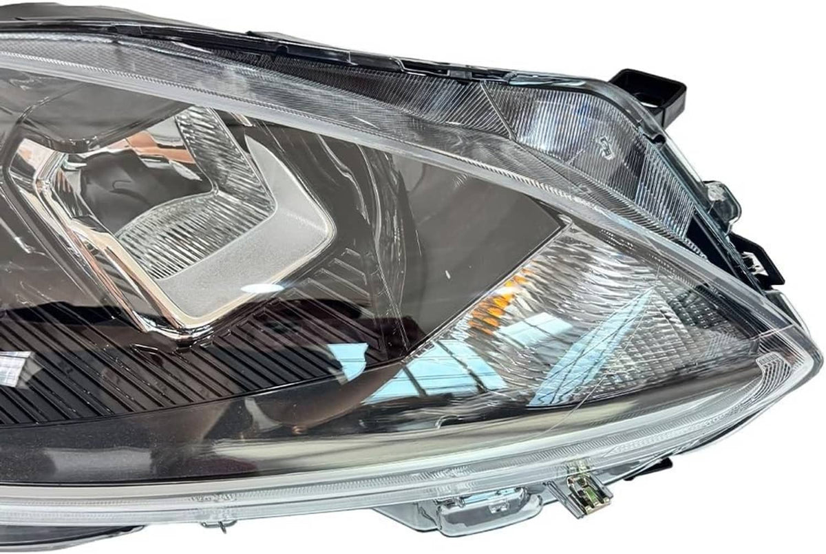 Right-side halogen headlight close-up of projector reflector and surrounding clear lens