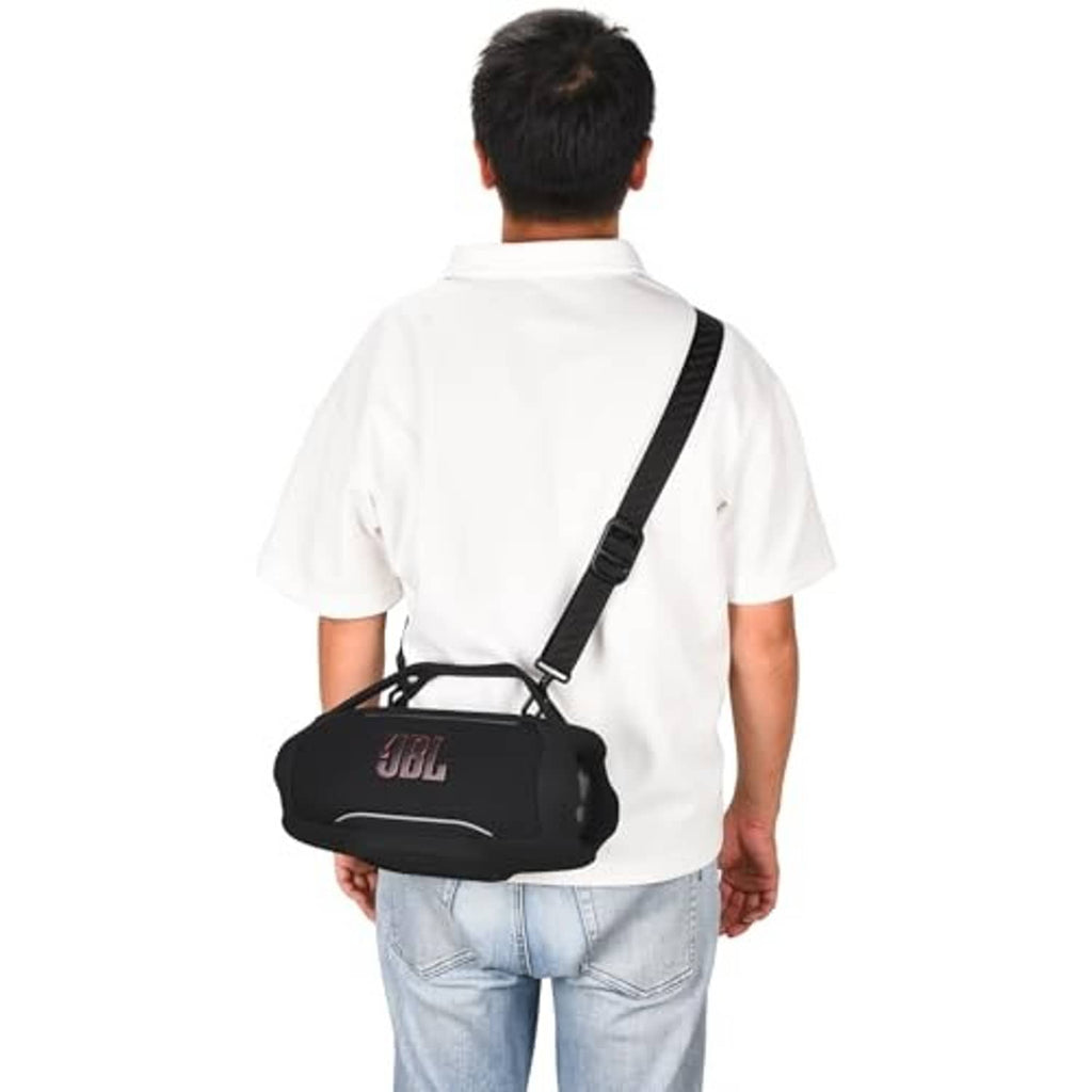 Black silicone speaker cover with shoulder strap worn crossbody for portability