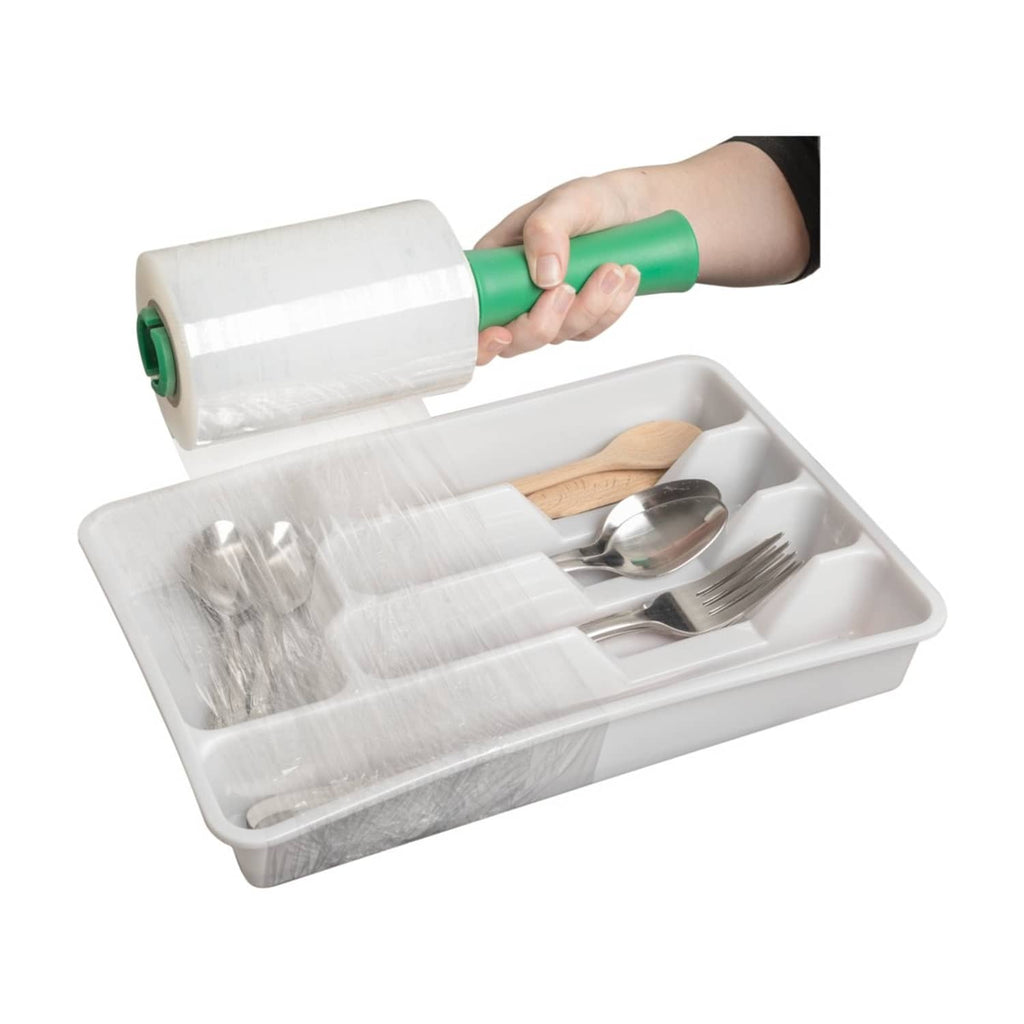 Duck Brand stretch wrap roll dispensing clear film over a boxed cutlery set