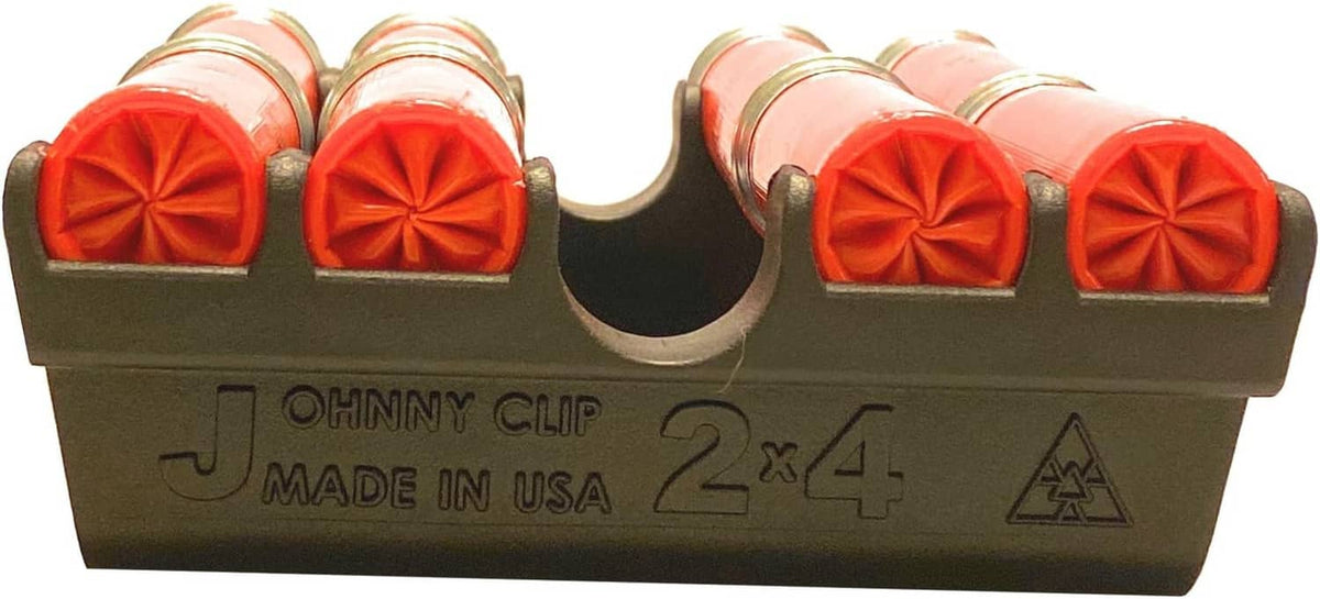 Johnny Clip 2x4 quad loader base with orange shell caps and molded markings