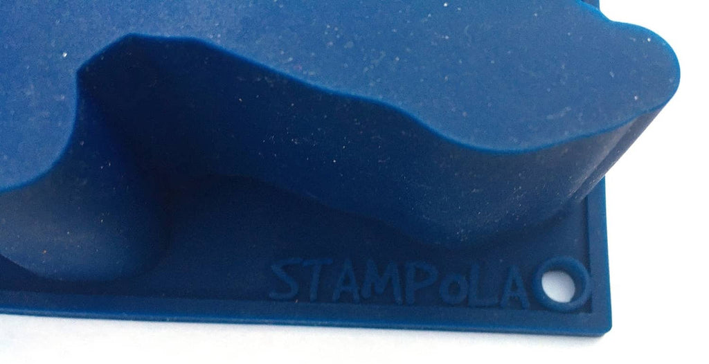 Blue silicone baking mold corner with molded brand text Stampola