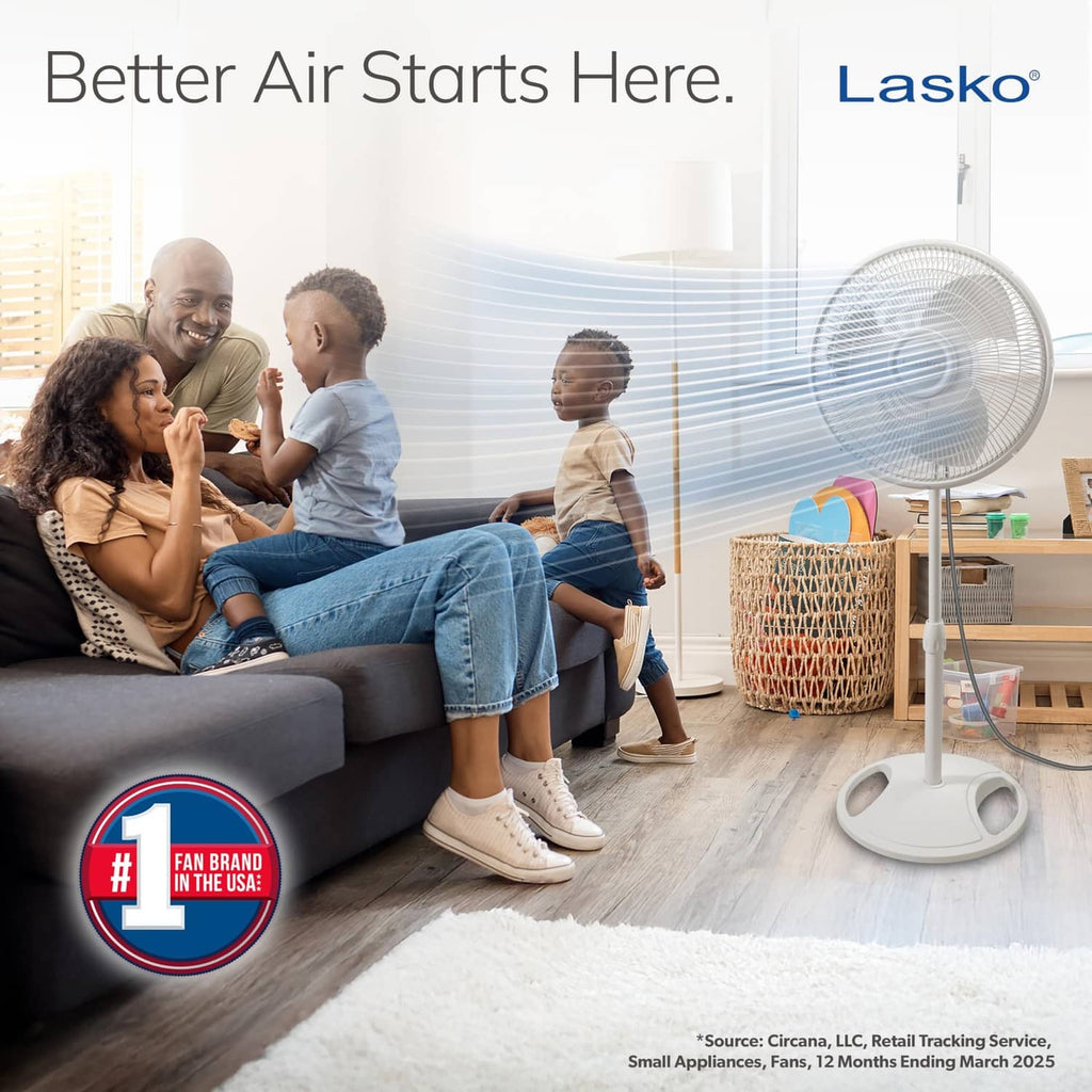 White Lasko stand fan with round grille on pedestal base.