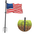Black flag pole with finial and tied American flag on top.