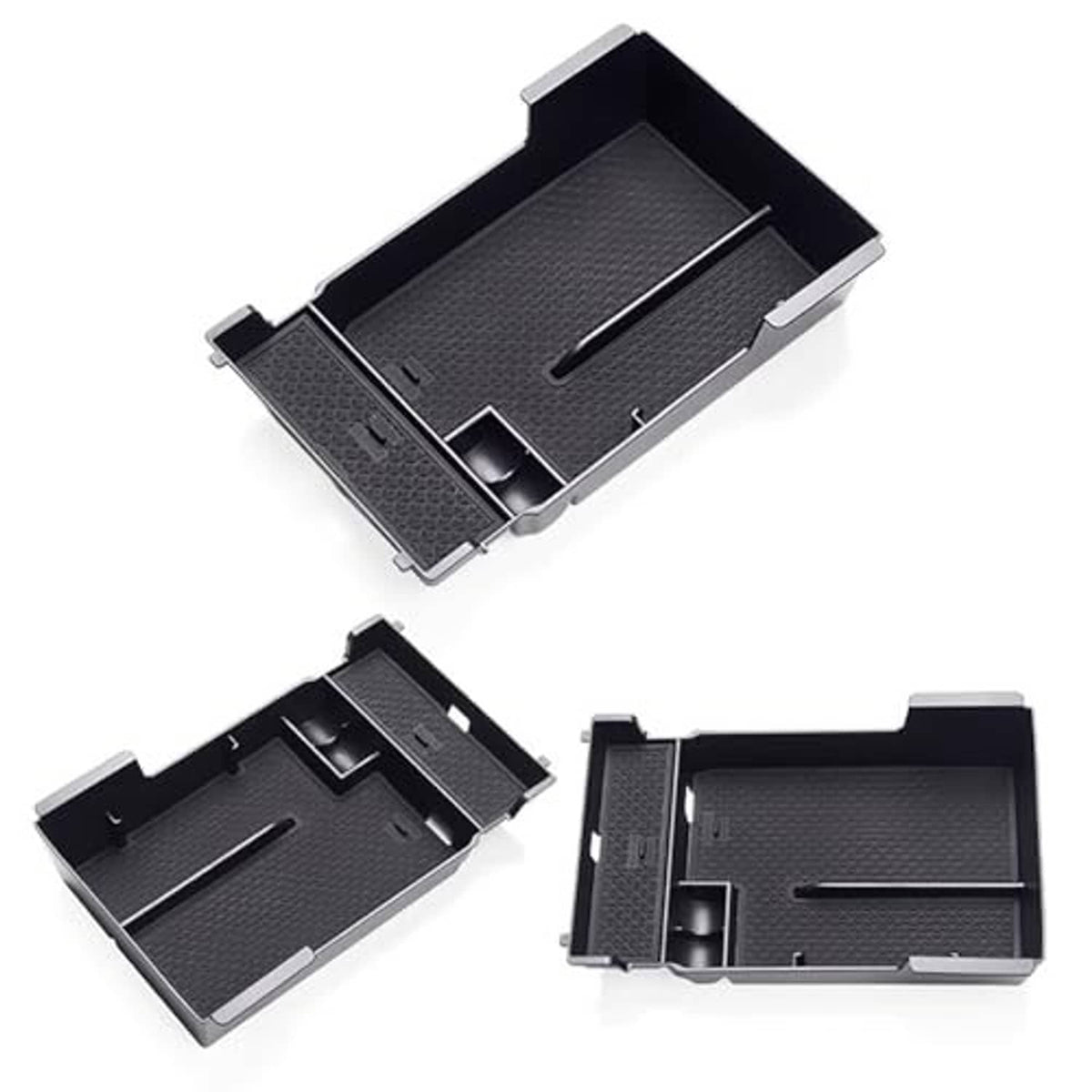 Set of black armrest cover components with textured surfaces and raised edges