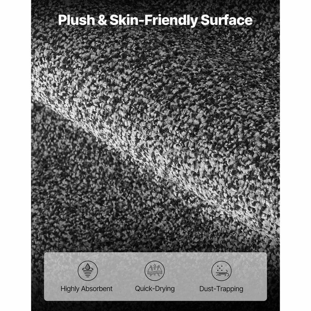 Grey door mat with plush speckled pile texture for absorbent surface
