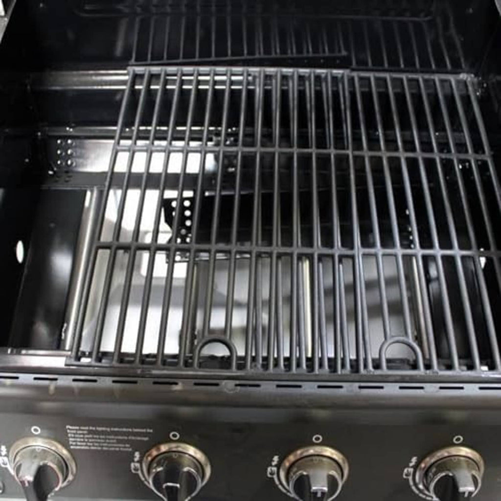 Black cast-iron cooking grate installed inside the grill firebox