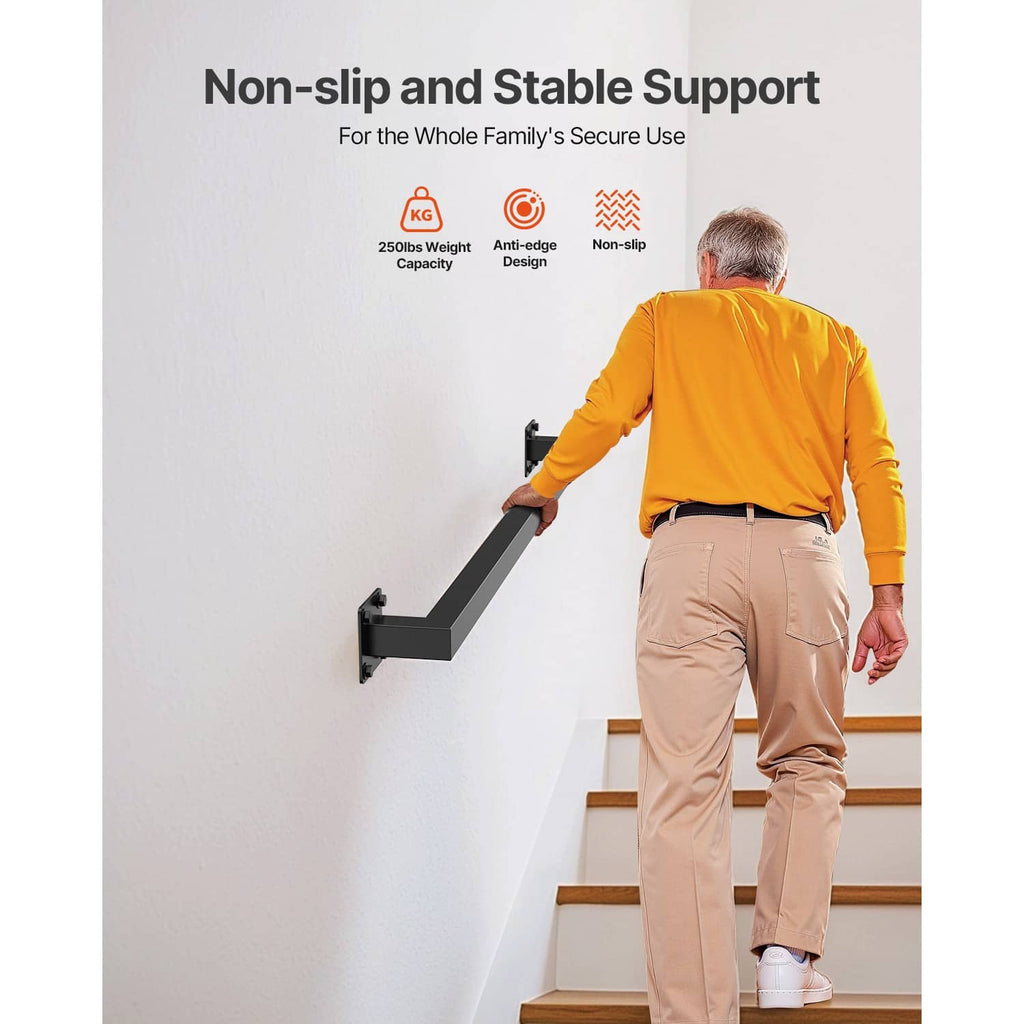 Wall-mounted stair handrail on bracket with black square tube on a staircase wall
