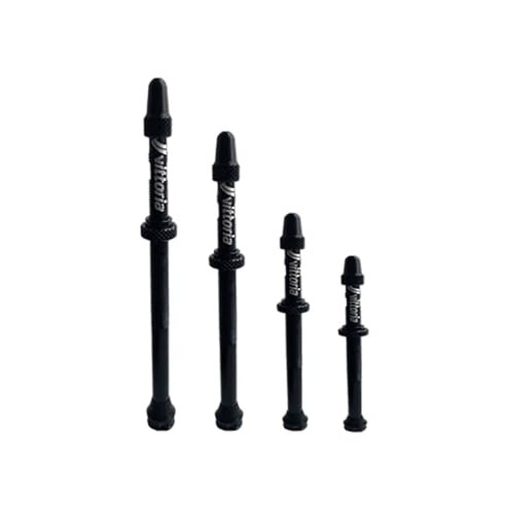 Set of black tubeless valve stems with caps, including multiple sizes
