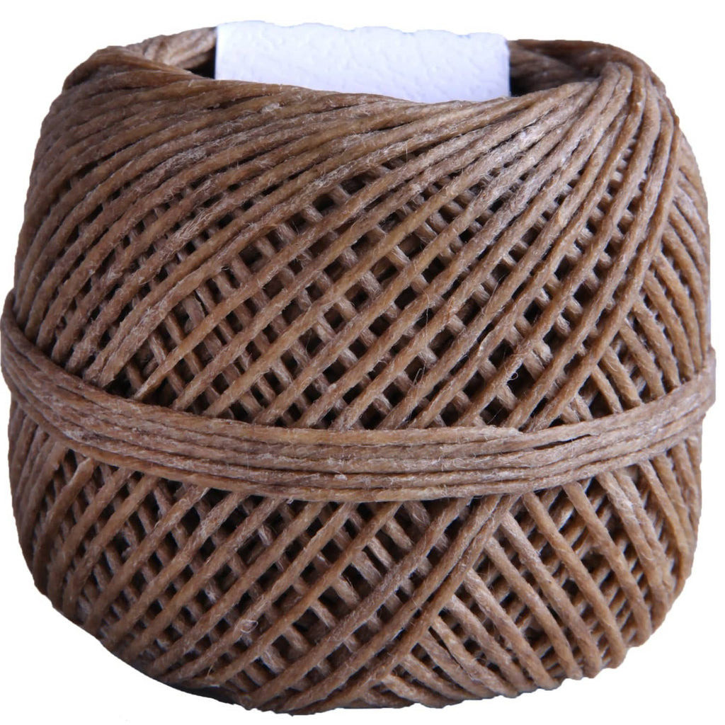 Brown coiled organic hemp wick spool, label not visible from top view