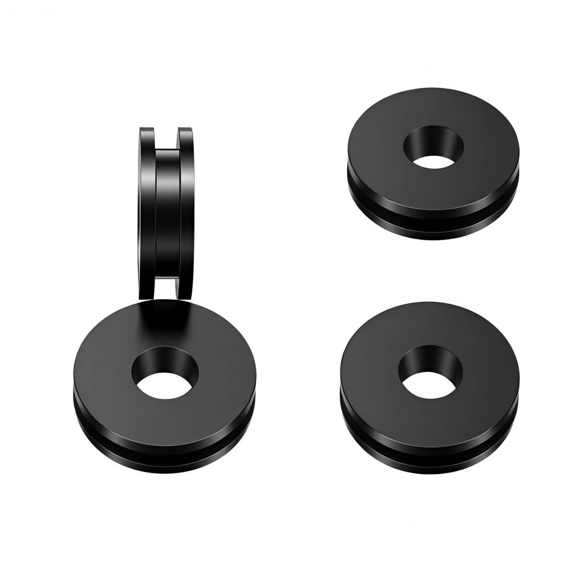 Black round bushing grommets with central holes, three-piece view
