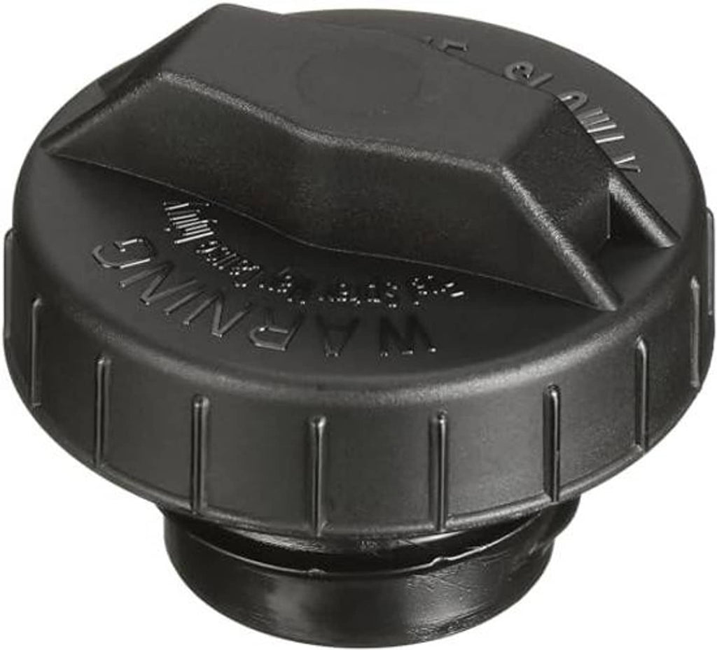 Black fuel tank cap top view with embossed markings and latch tab