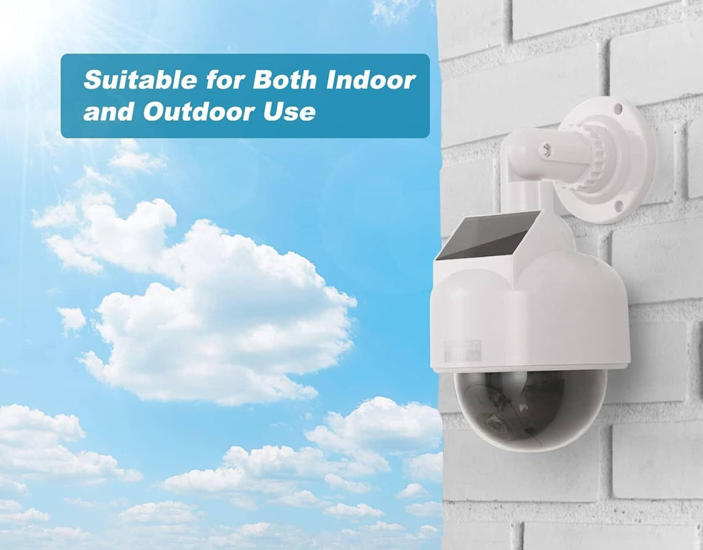 White wall-mounted fake security camera with solar panel and black dome sensor