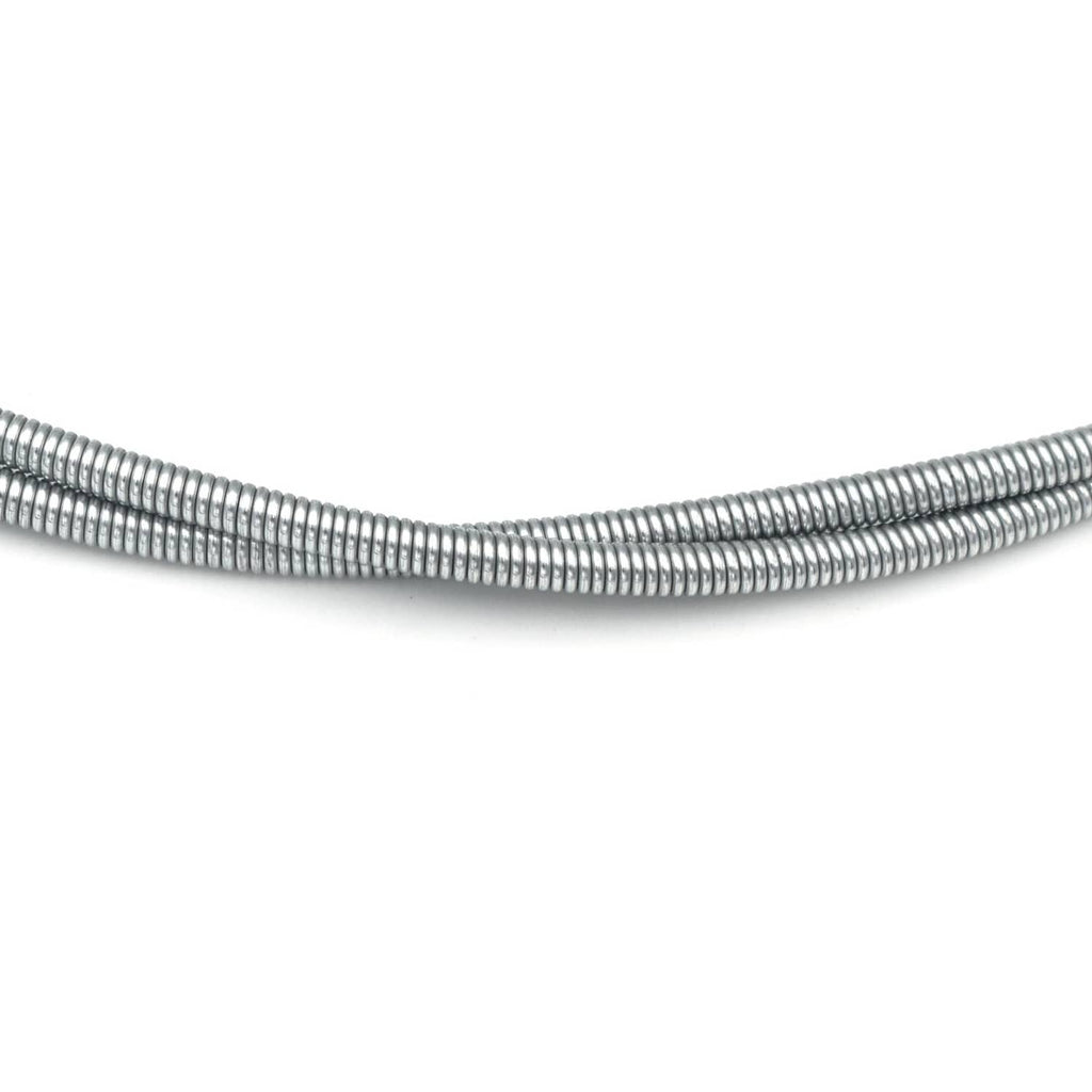 Silver braided choke cable conduit with tightly coiled wire section