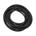 Black rubber tubing coil, neatly looped with smooth round profile