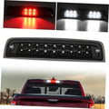 Third brake light LED bar with smoked lens and black housing, red LEDs lit