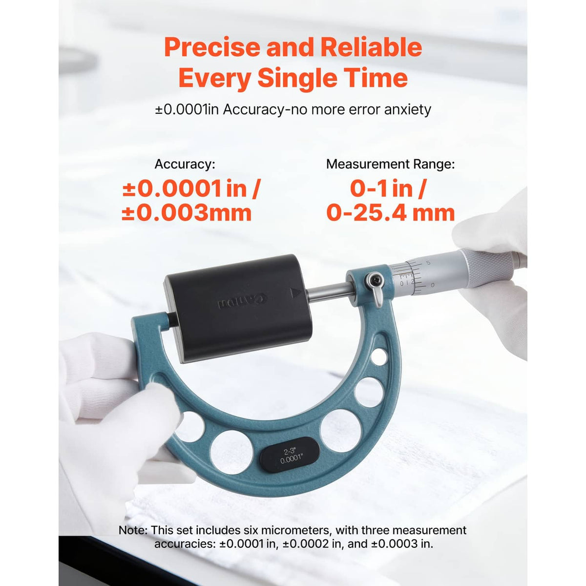 Uimoso micrometer held in hands, blue frame with silver thimble