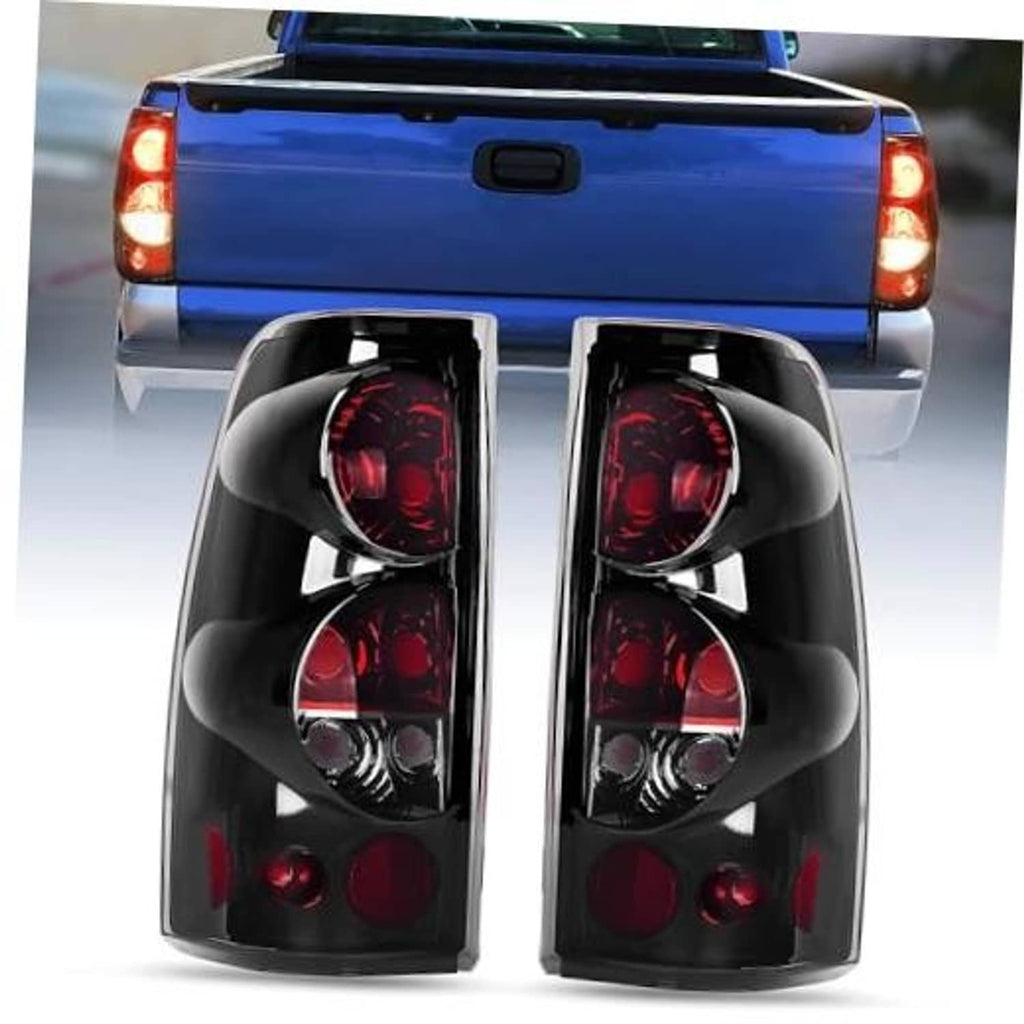 Smoked-lens taillight assembly, black housing with four red lamps, left/right pair