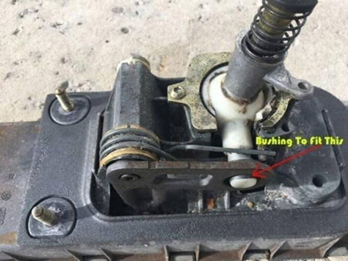 Installed manual transmission bushing on gear shifter bracket, showing fitment